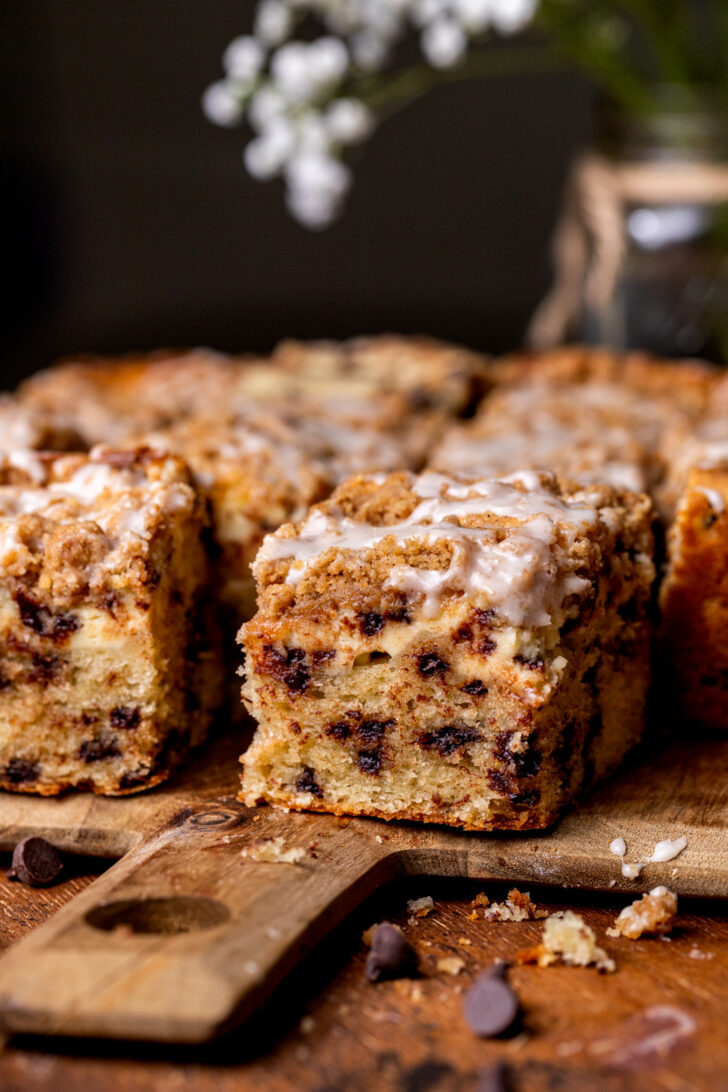Side view of one piece of chocolate chip coffee cake.