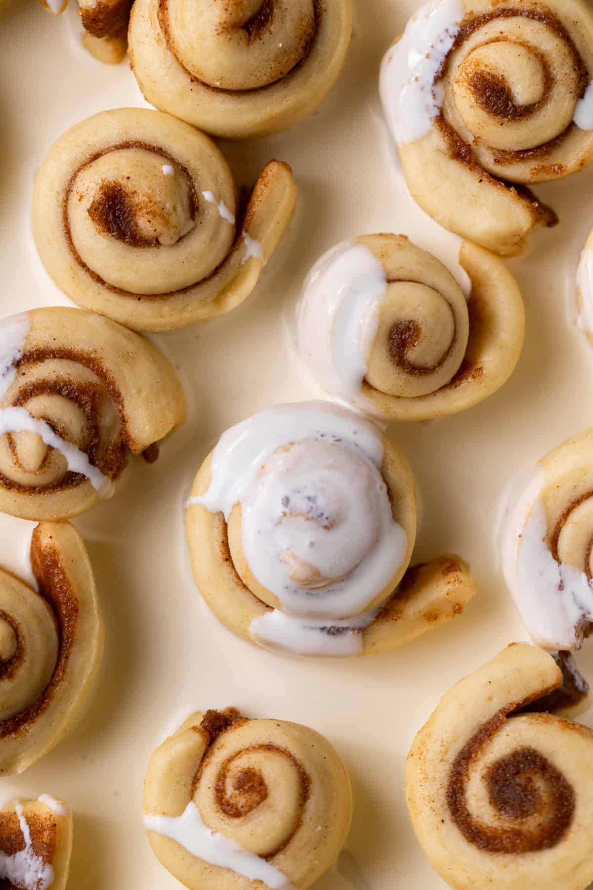 Heavy cream on top of rolls.