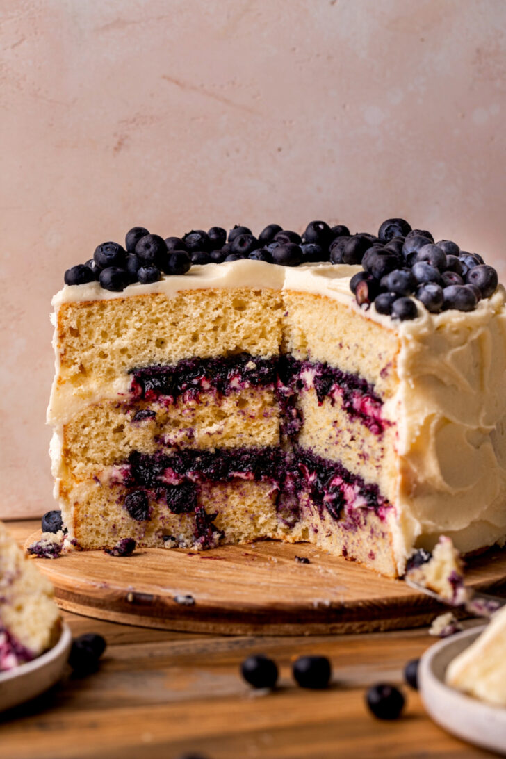 Side view of split open blueberry jam cake.