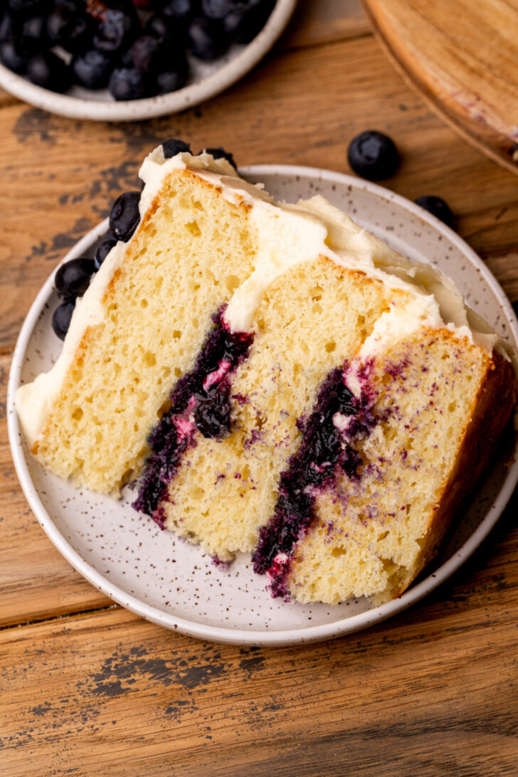 One slice of cake on a plate.