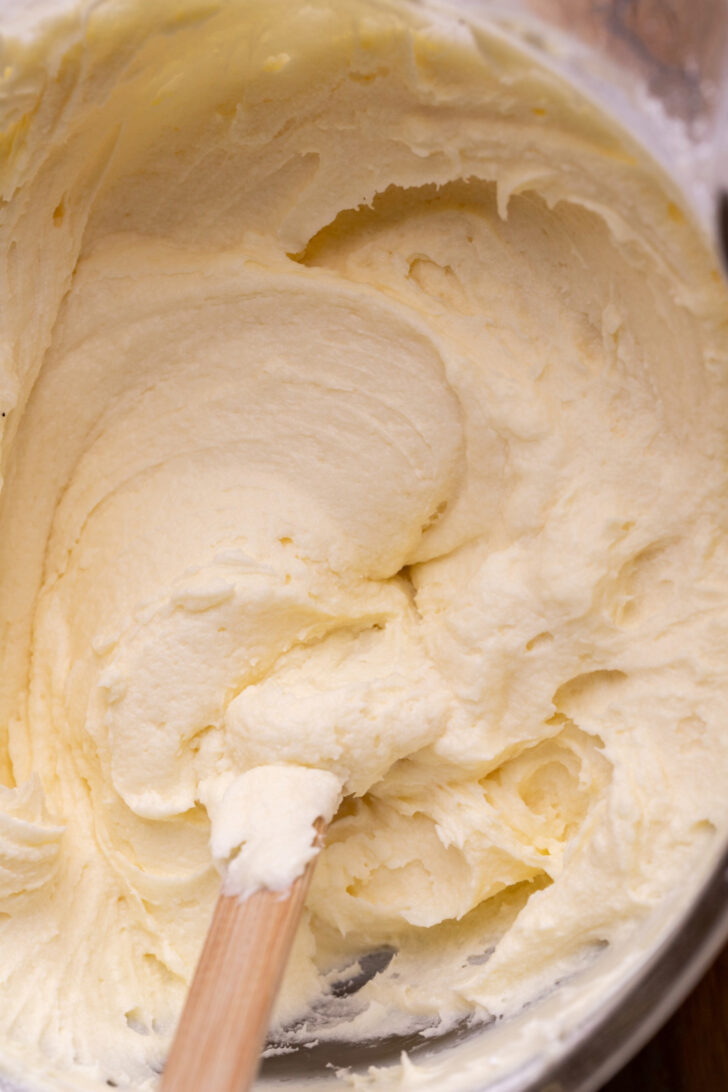 Cream cheese frosting in a bowl.