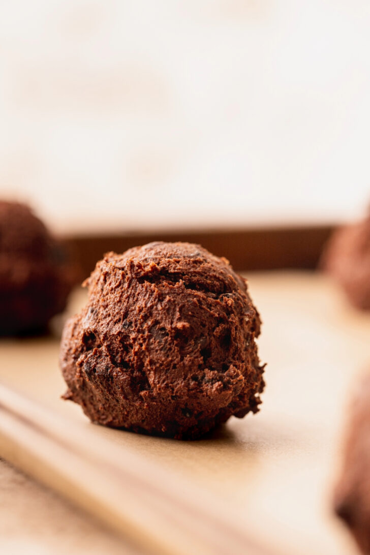 Cookie dough ball in a pan.