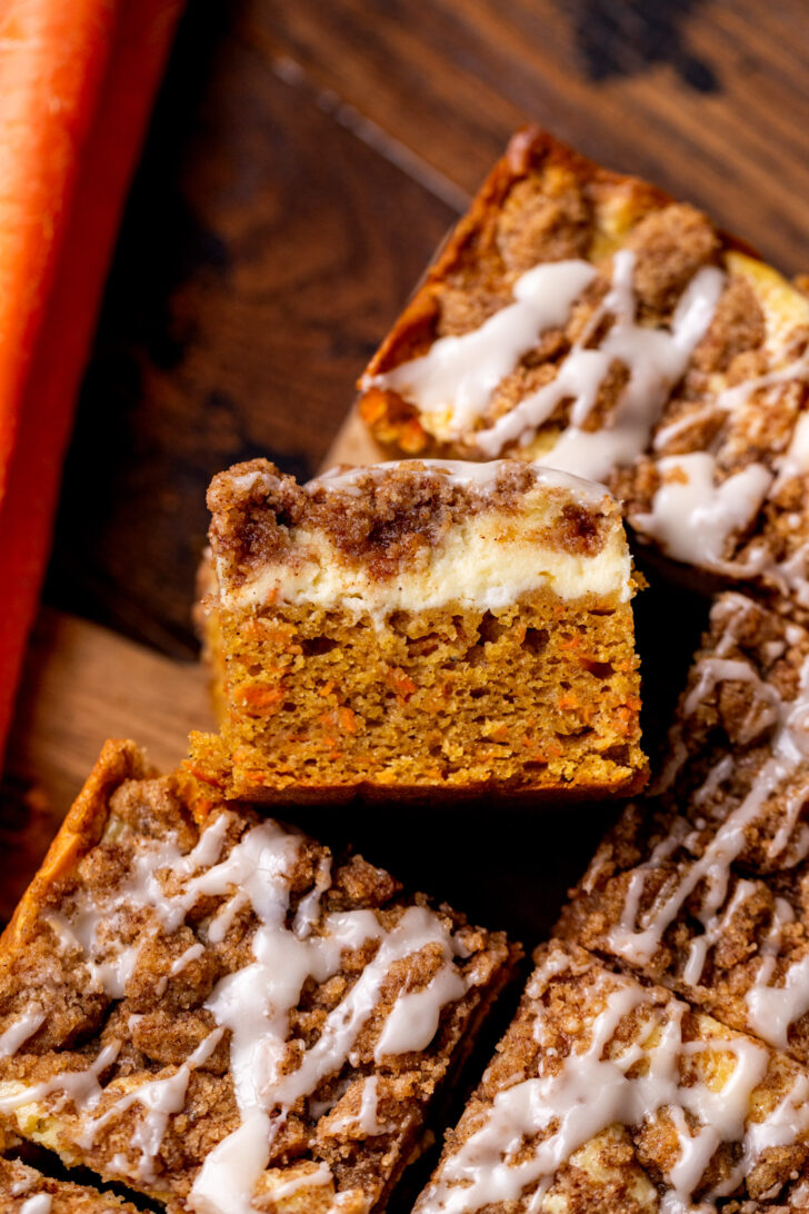 One slice of carrot cake coffee cake on its side.