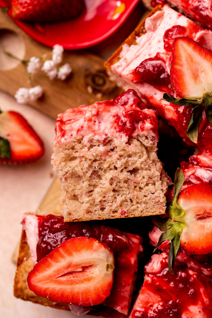 One piece of strawberry cake on its side.