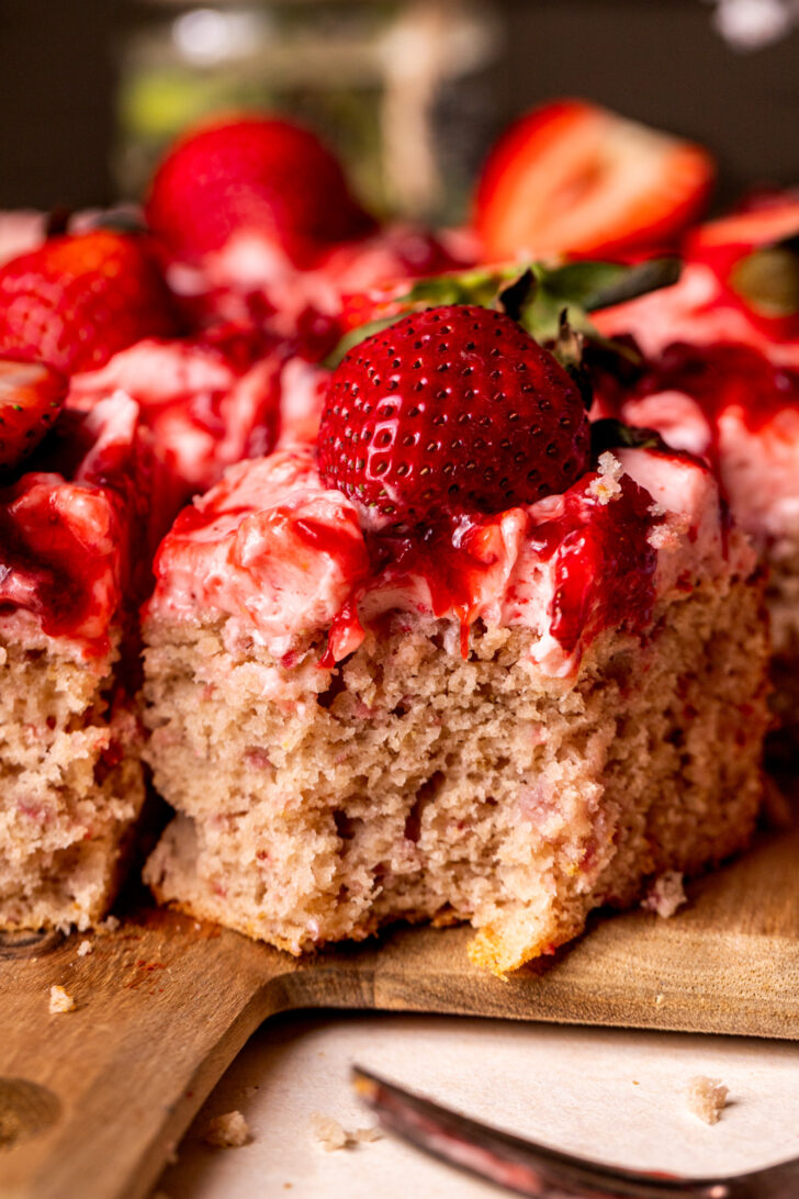 Bite missing from the cake.