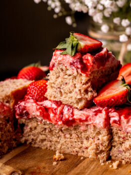 Stack of strawberry cake slices.