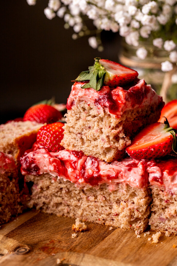 Stack of strawberry cake slices.