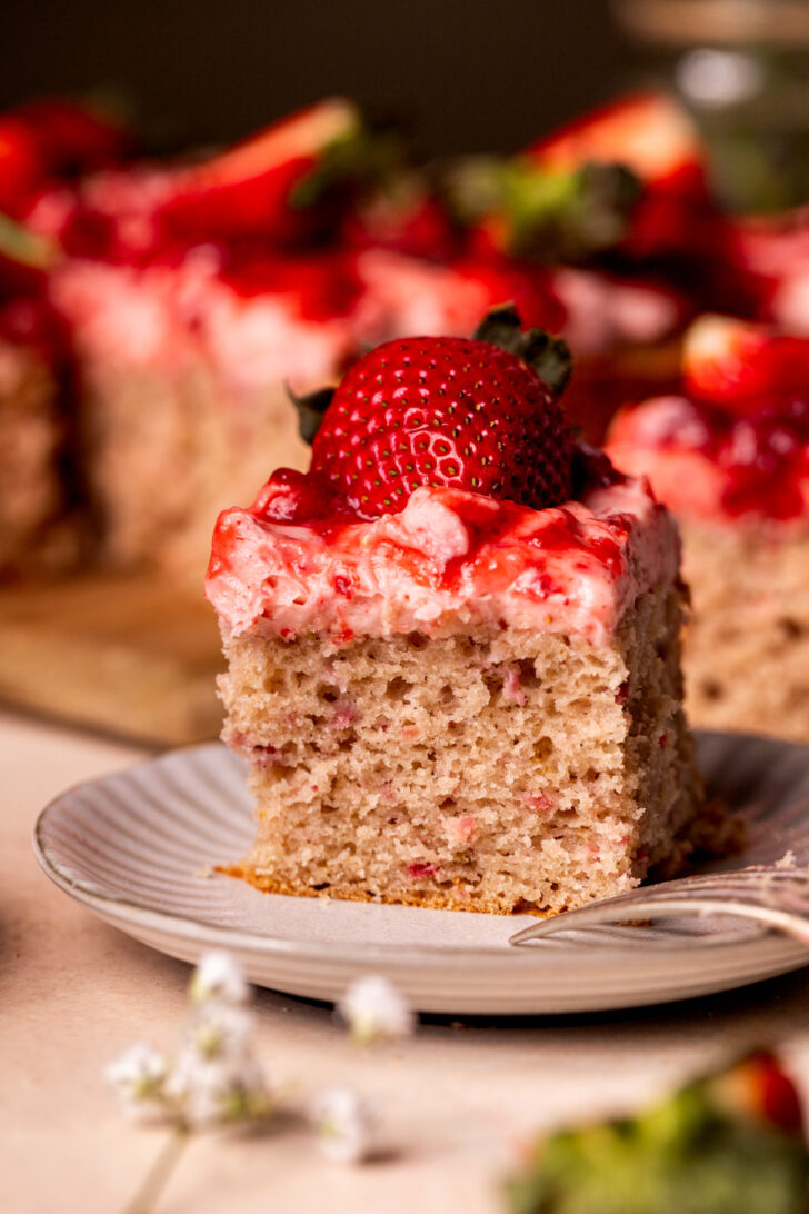 One slice of cake on a plate.