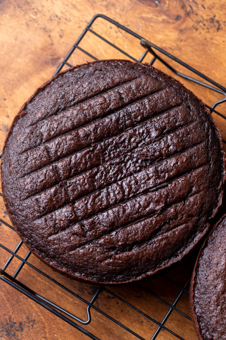 Baked cake on a wire rack.