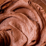 Side view of chocolate cream cheese frosting.