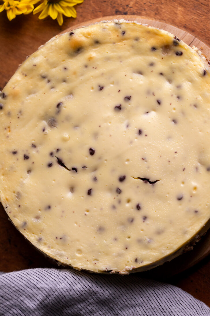 Baked cheesecake on a platter.