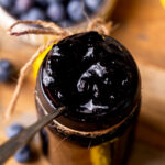 Close up of the top of the blueberry jam in a jar.