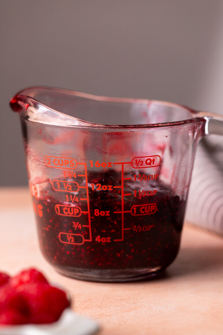 Jam in a measuring cup.