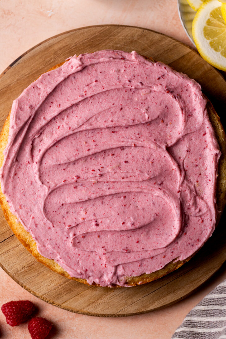 Raspberry frosting on top of the cake.