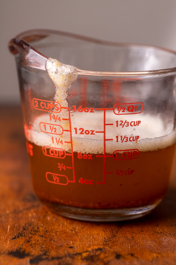 Butter in a measuring cup.