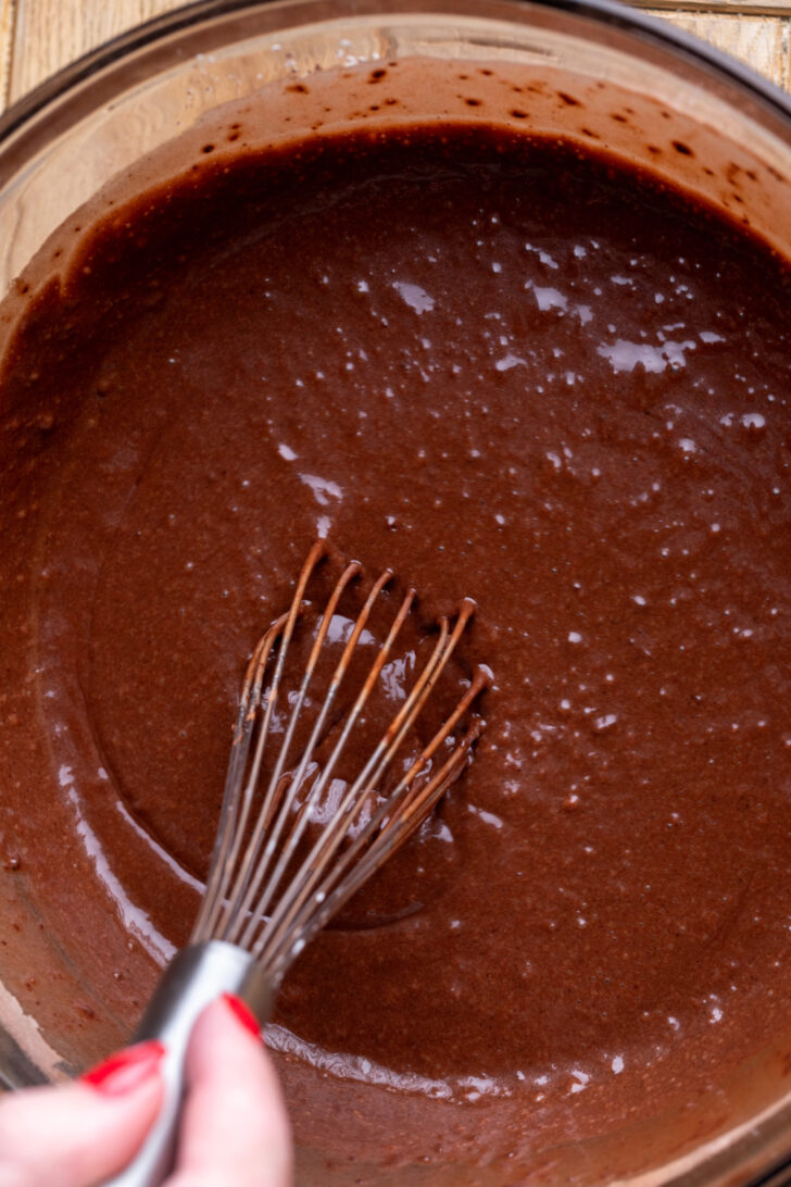 Chocolate cake batter in a bowl.