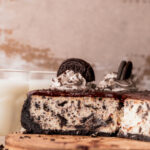 Close up of side view of Oreo cheesecake.