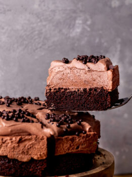 Taking a slice out of the chocolate mousse cake.