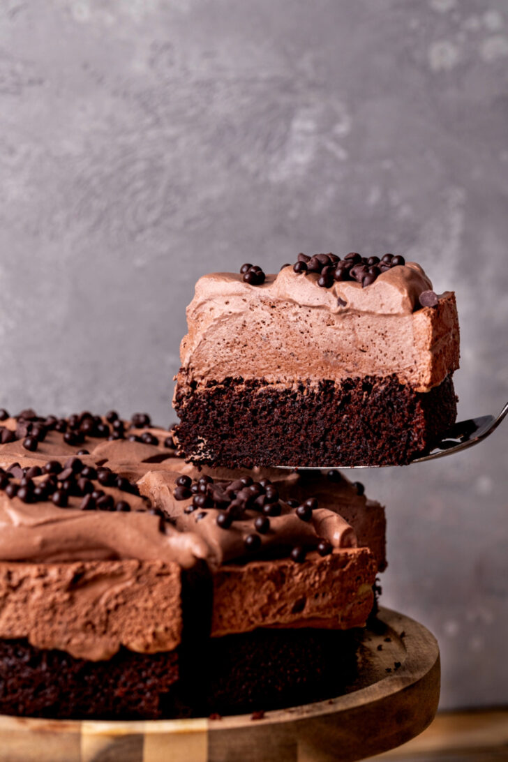 Taking a slice out of the chocolate mousse cake.