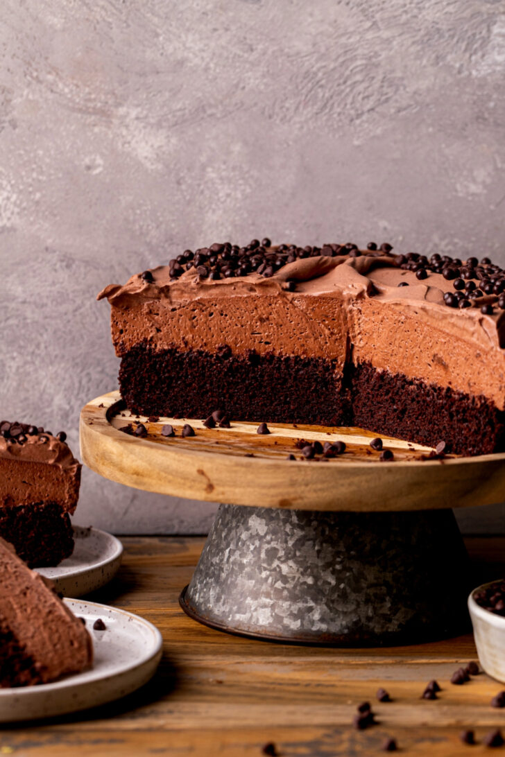 Cake split open on a cake stand.