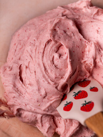 Strawberry cream cream cheese frosting in a bowl.