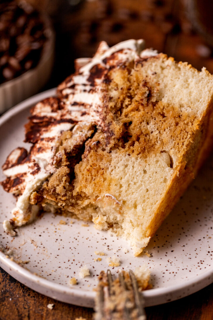 Bite missing from tiramisu cake.