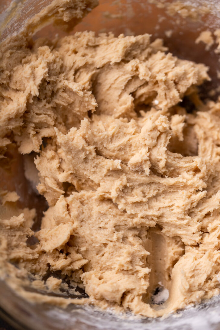 Cookie dough with no chocolate chips in a bowl.
