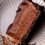 Top view of a slice of no bake chocolate cheesecake.