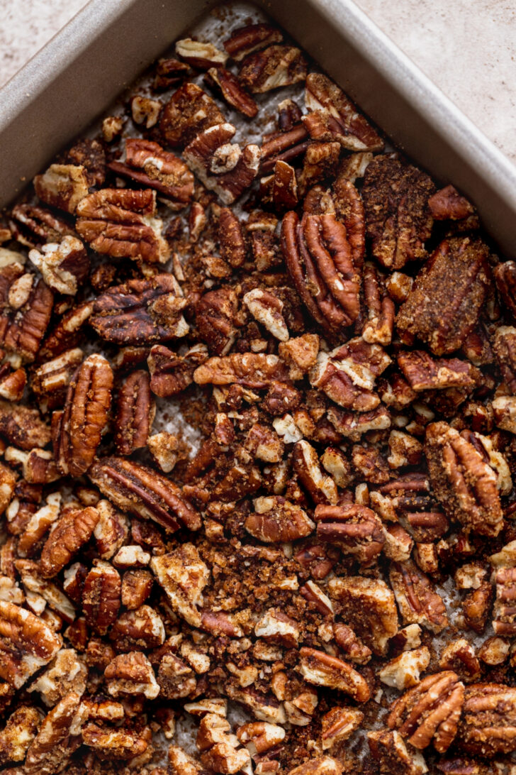 Pecans on a cookie sheet.