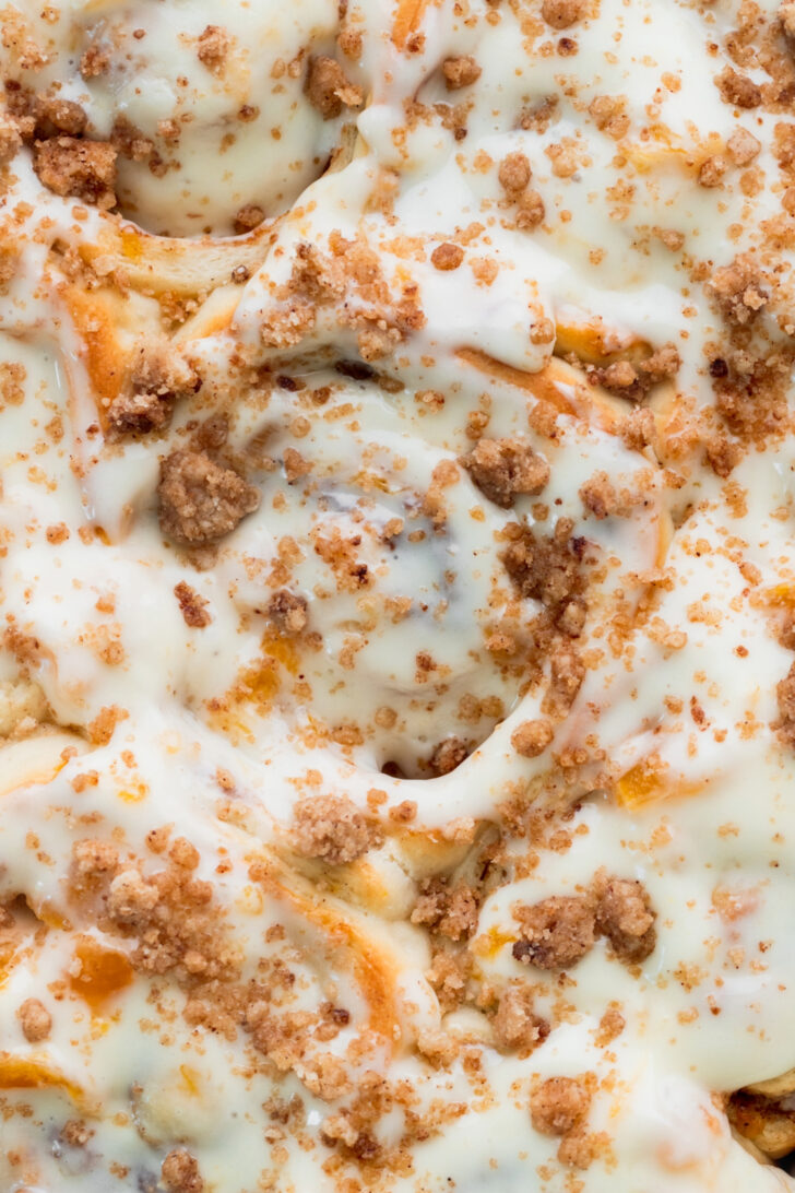 Top view of peach cobbler cinnamon rolls.