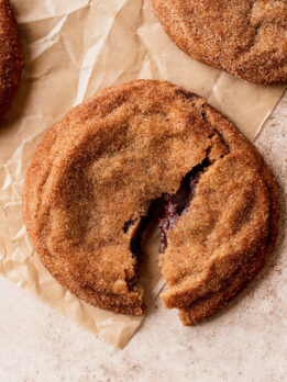 One churro cookie split in half.