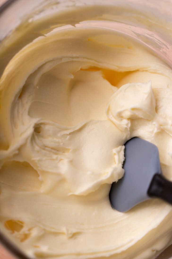 Cream cheese frosting in a bowl.