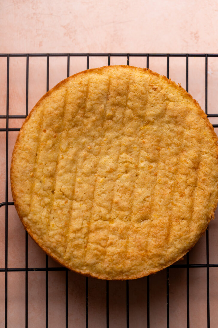 Baked cake on a wire rack.