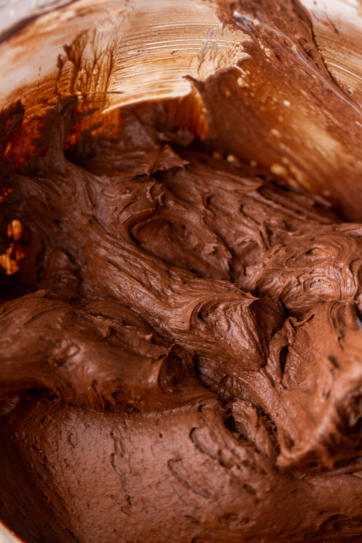 Chocolate cream cheese frosting in a bowl.