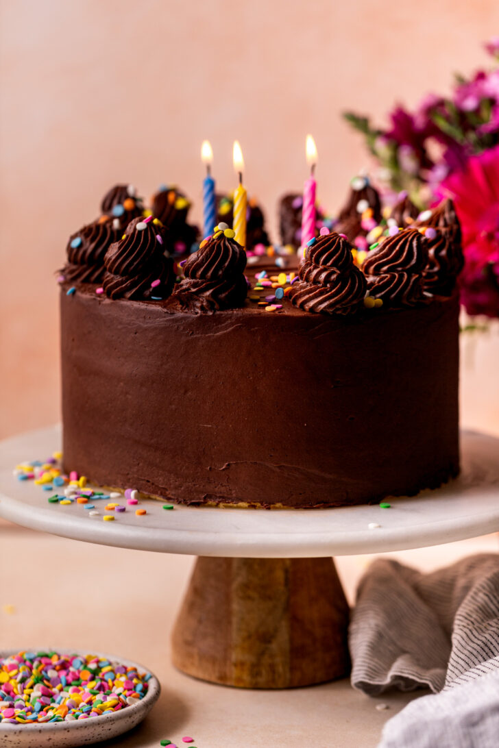 Decorated cake on a cake stand.