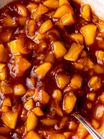 Close up of peach pie filling.