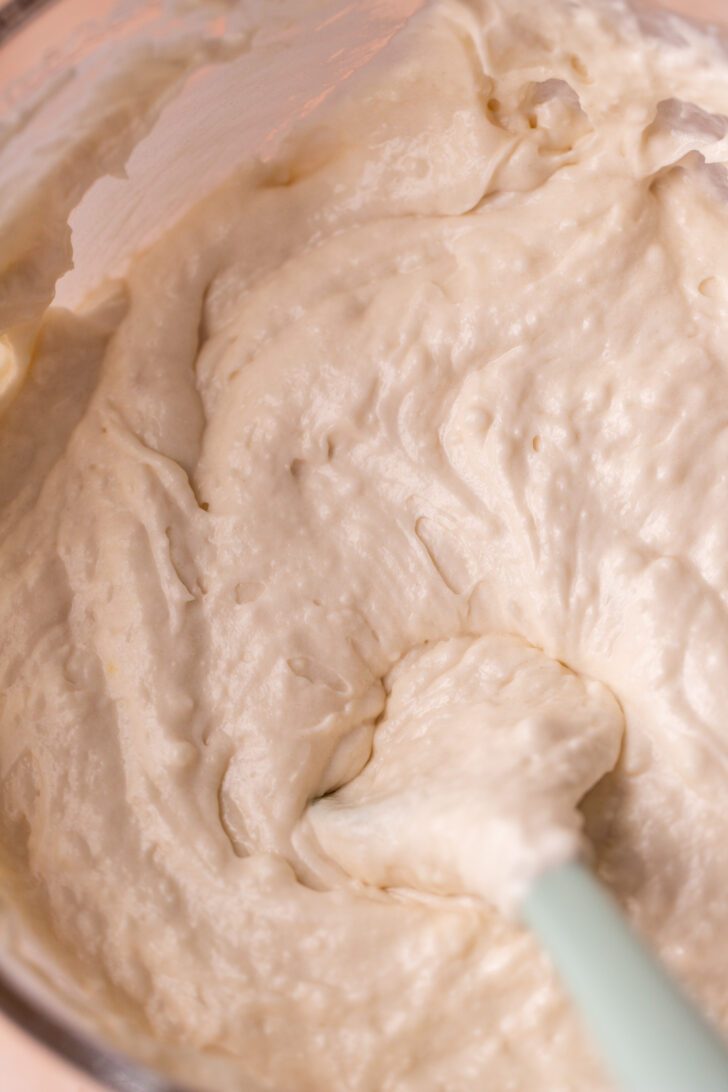 White cake batter in a bowl.