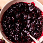Cherry pie filling in a bowl.