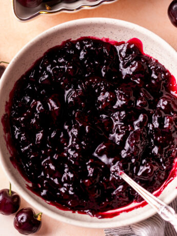 Cherry pie filling in a bowl.