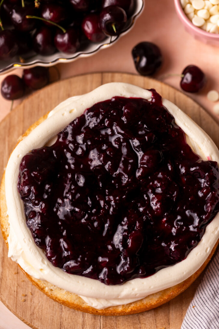 Cherry pie filling on top of cake.