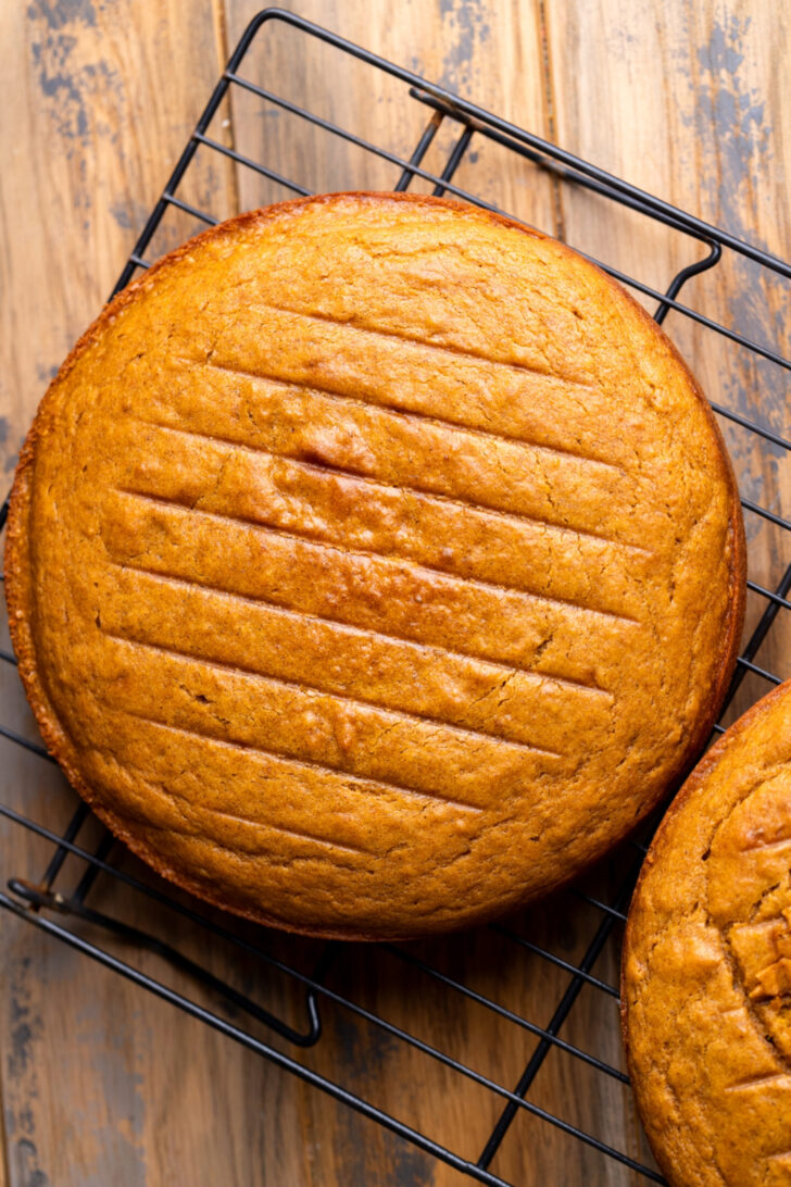 Top view of pumpkin cake on a wire rack.