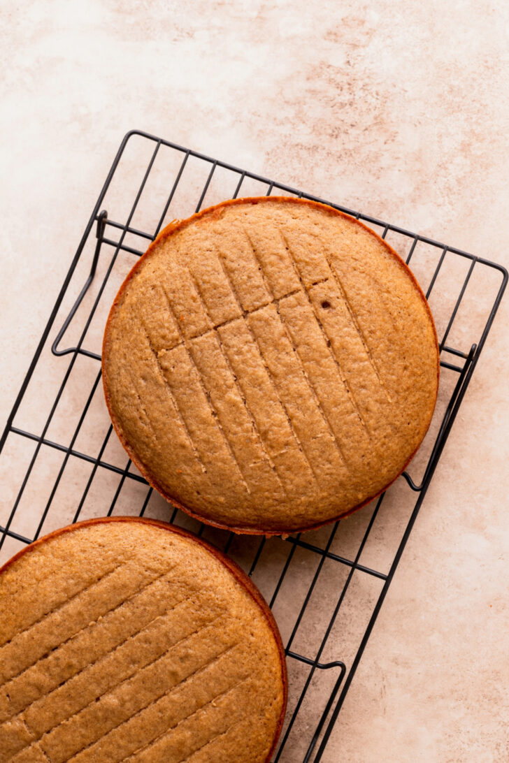 Cake layers on a wire rack.