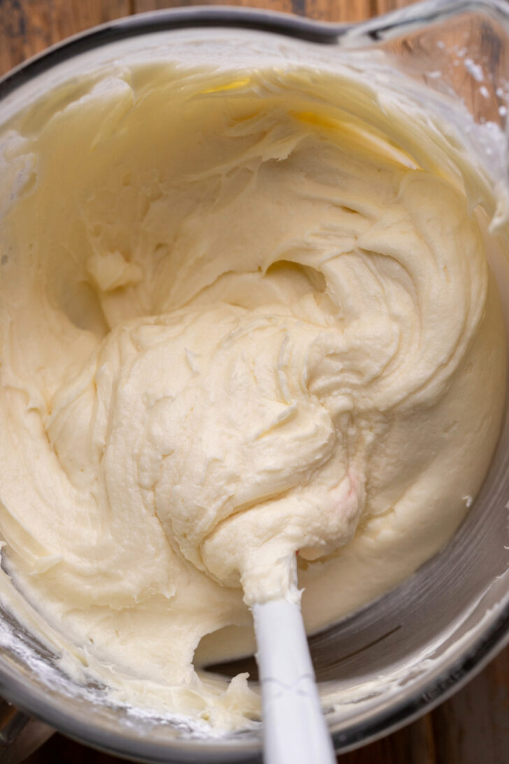Cream cheese frosting in a bowl.