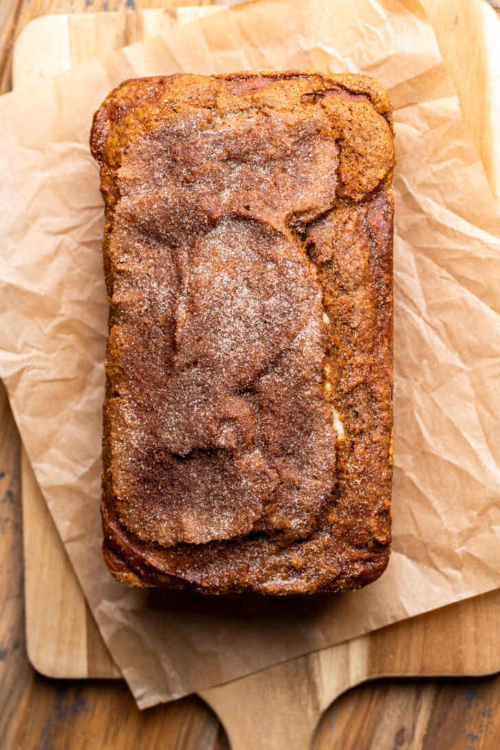 Cooked bread on a wood board.