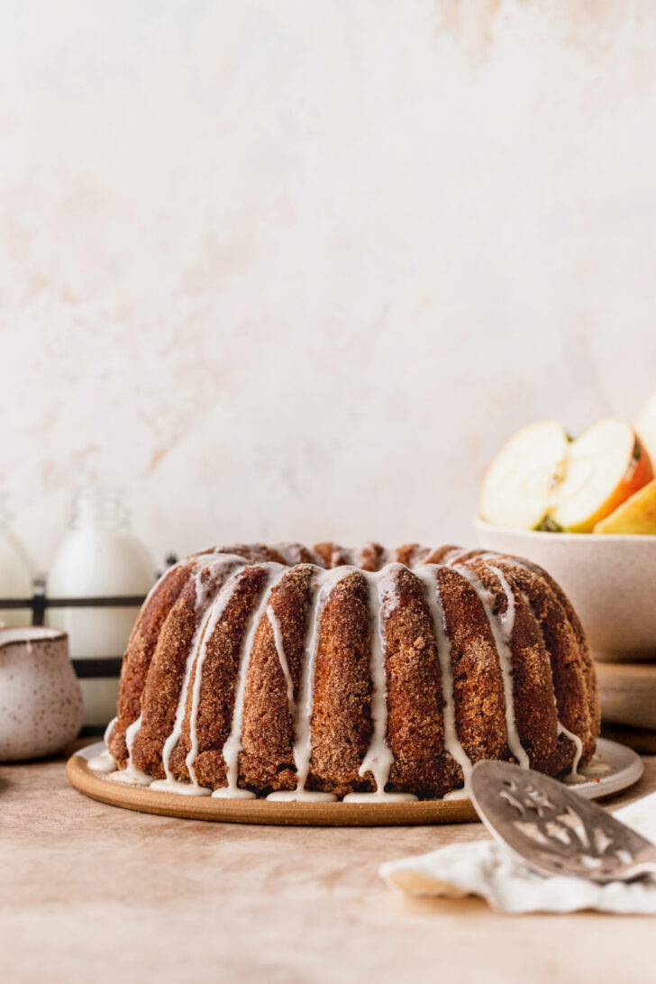 Decorated cake on a wood board.