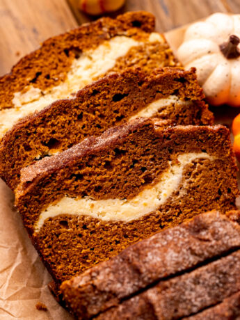 Top view of pumpkin cream cheese bread sliced up.