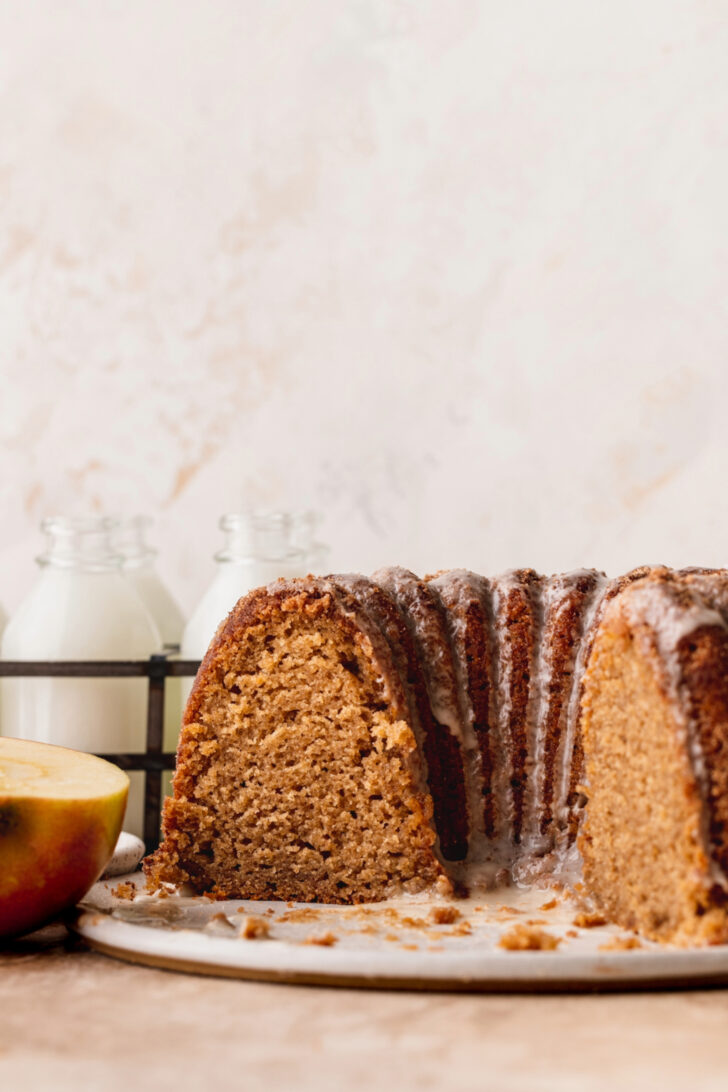 Side view of apple cider donut cake split open.
