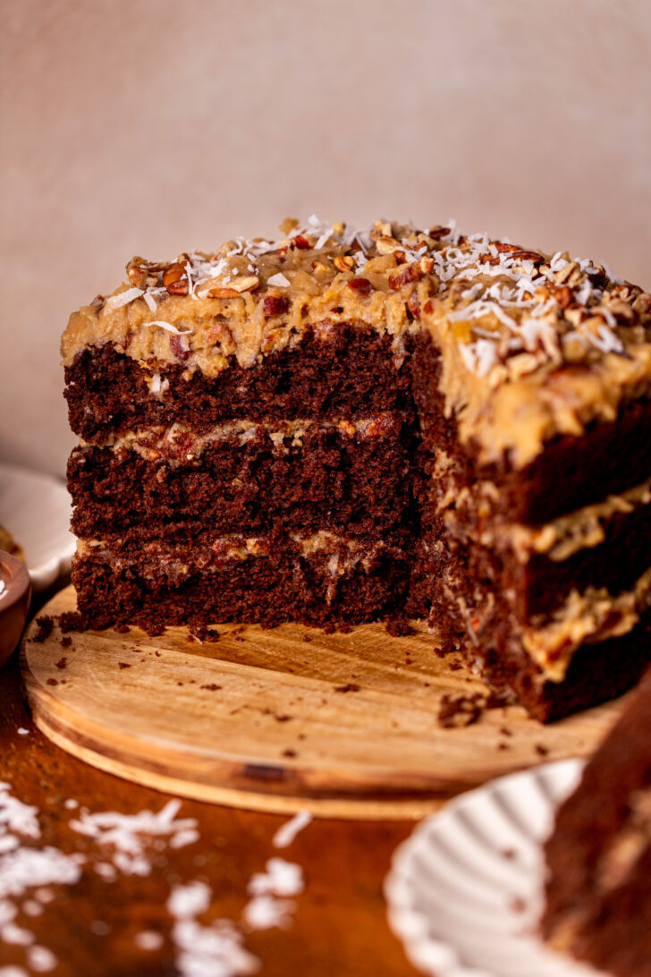 German chocolate cake on a wood board.