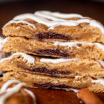 Stack of two cinnamon roll cookies split in half.