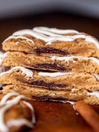 Stack of two cinnamon roll cookies split in half.